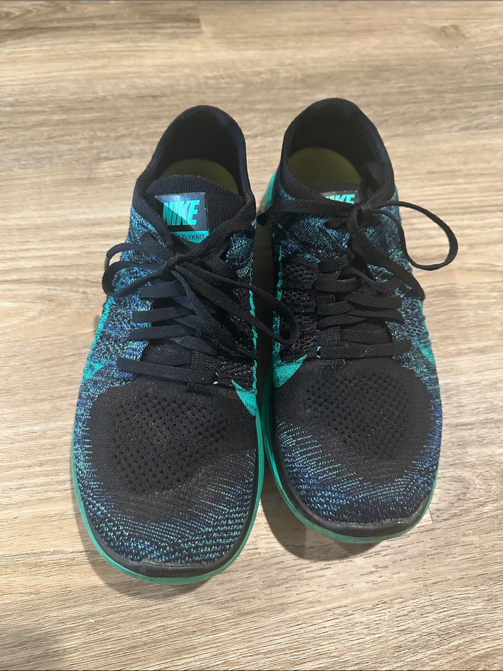 Nike Black & Teal Flyknit Athletic Sneakers